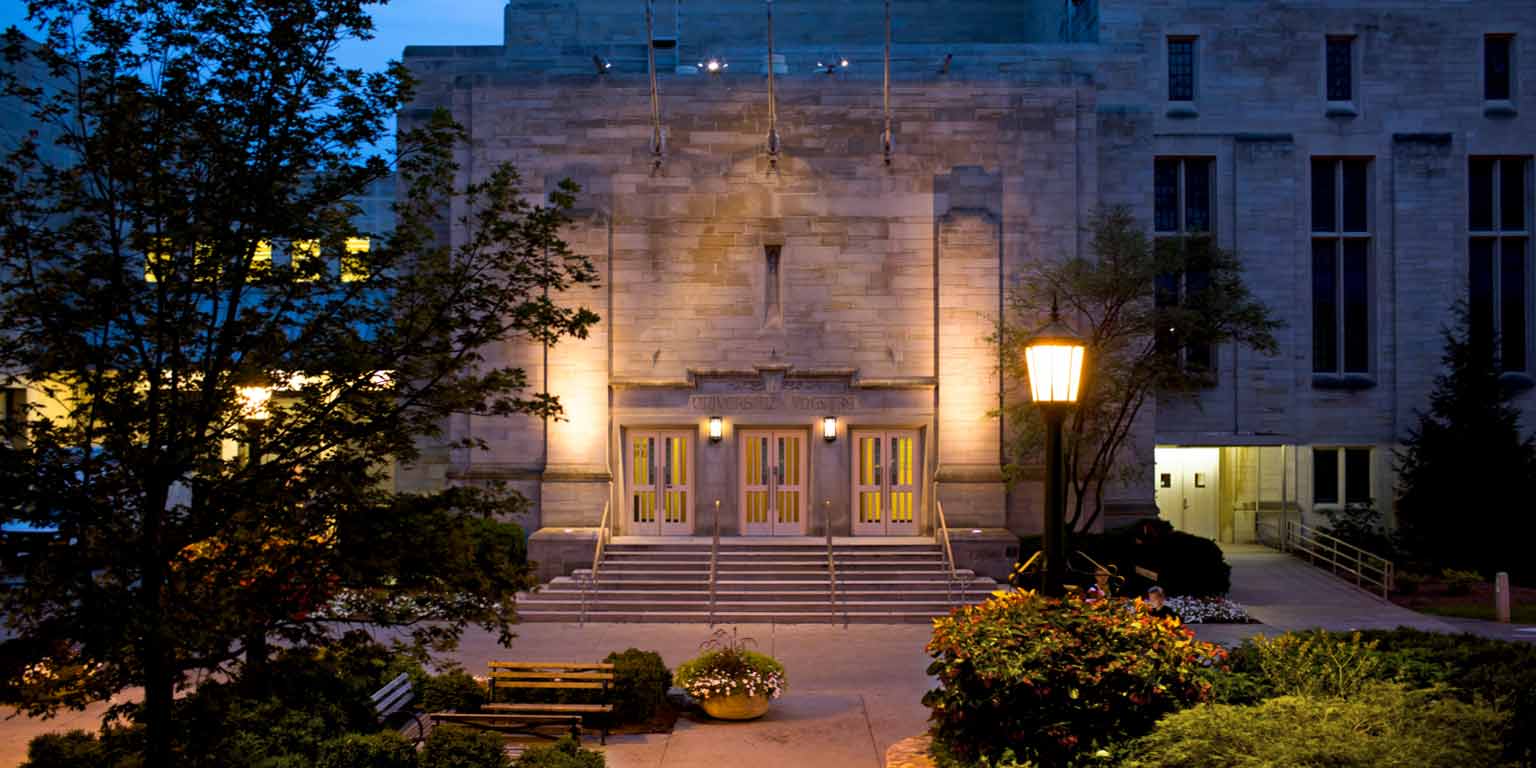 The facade of IU Cinema at night