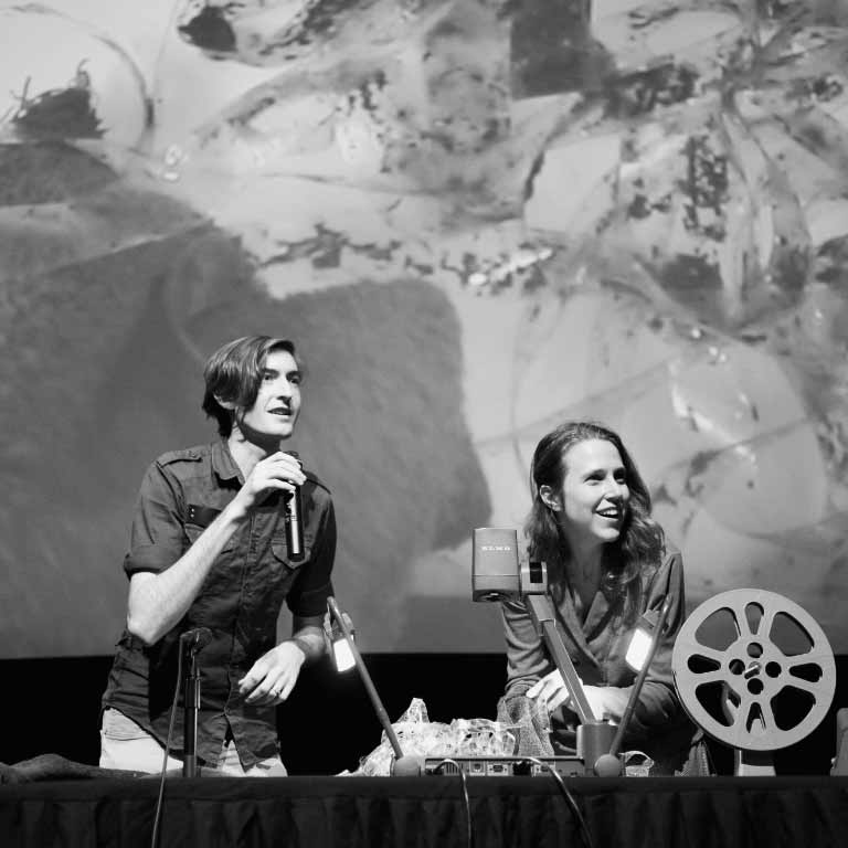 Two guest presenters with film equipment